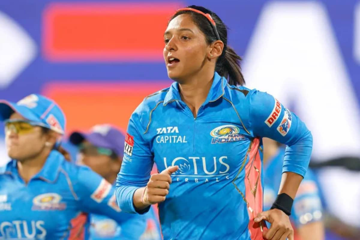 Harmanpreet, bowlers guide unbeaten MI to playoffs