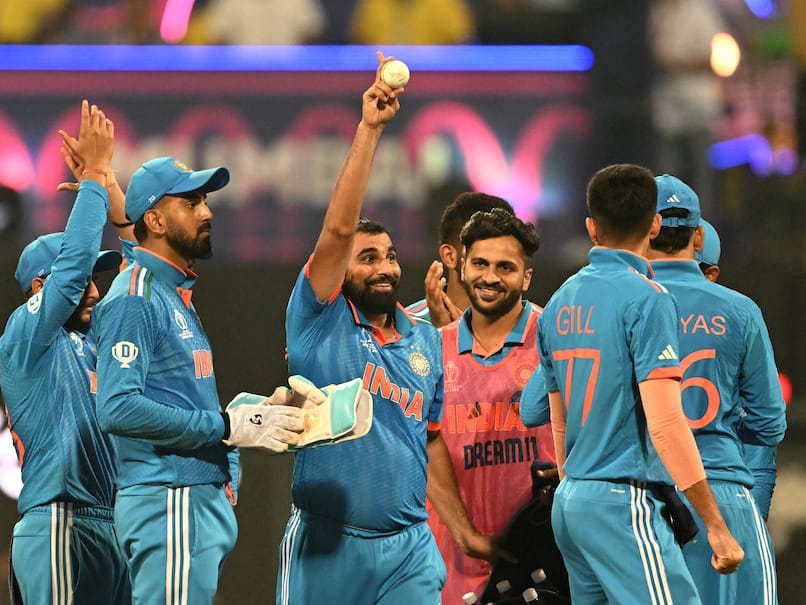 Shami leads rout of Sri Lanka as India advance unbeaten into semi-finals