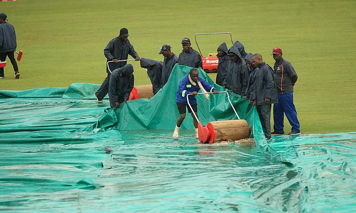 Rain rescues Zimbabwe after Hume and Young trigger a collapse